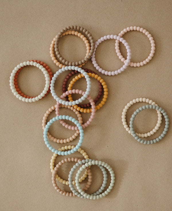 Mushie Pearl Teething Bracelet (Berry/Marigold/Khaki) - Mushie